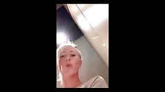 Amateur harlot masturbates in a public restroom
